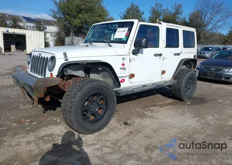 2011 Jeep Wrangler Unlimited Sahara из США, поврежденный, VIN 1J4HA5H10BL602015